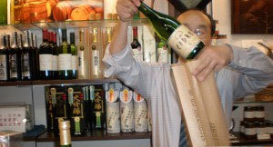 Get some local sake from a friendly shopkeeper